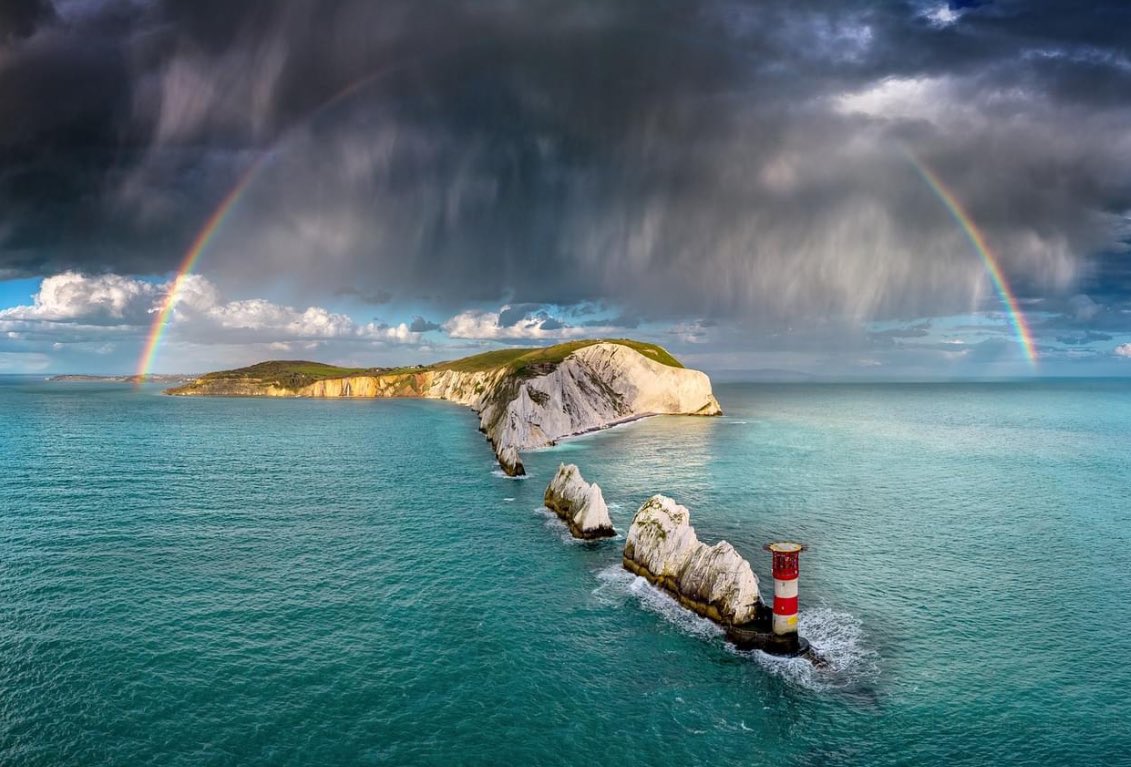 Amazing Jamie @islandvisions Jamie Russell - I have been wanting to capture this image for many years but the conditions never quite came together, but last night (evening) I could see a large shower looming in the distance towards Salisbury that was moving this way, so made