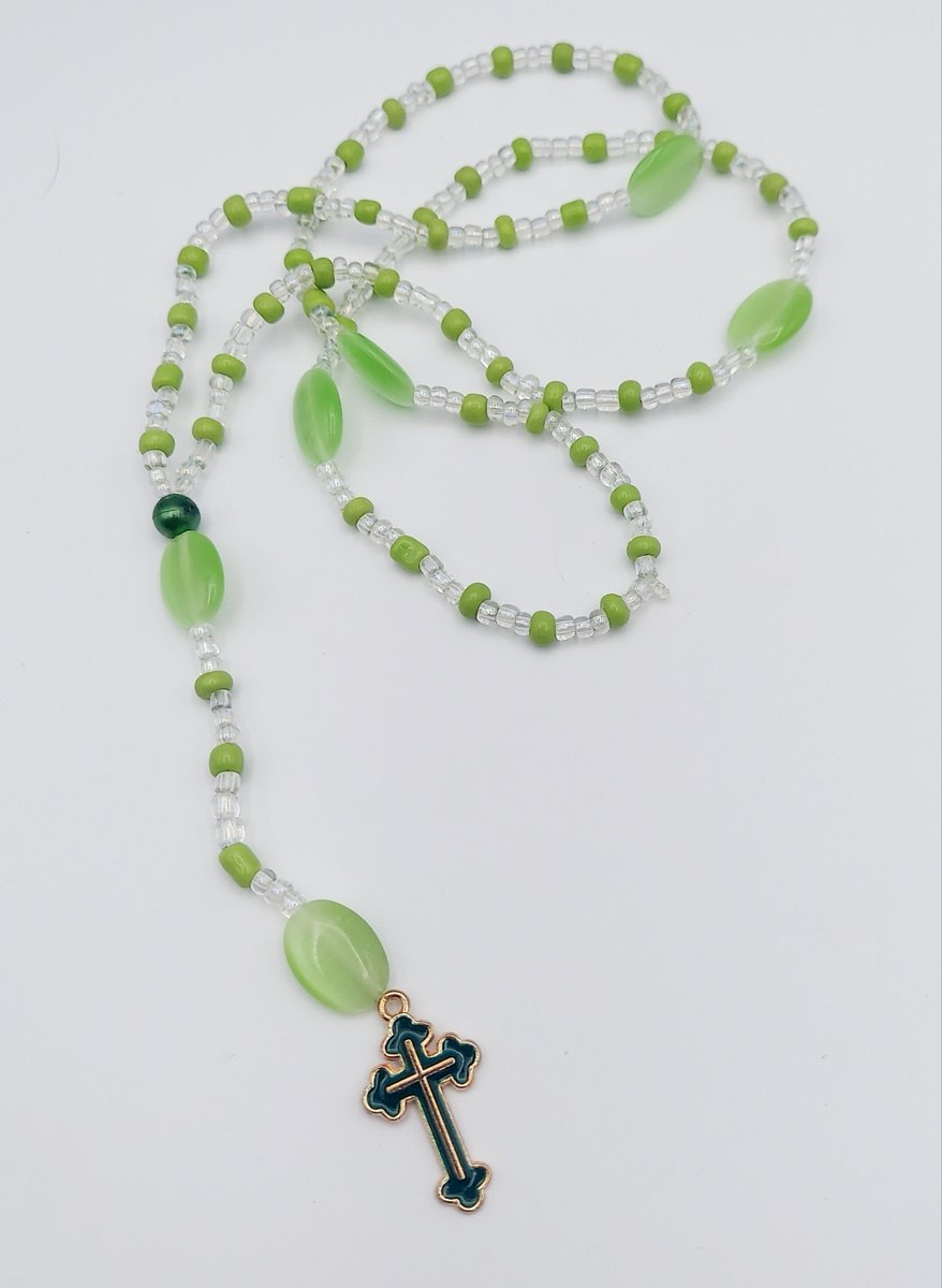 Meet Grace, an exquisite rosary crafted by our designer, Catherine. With pastel green and clear beads inspired by spring's vibrant freshness, each piece radiates serene beauty. Discover Grace's gentle elegance in our collection. 🌸#Rosary #SpringVibes craftycadychicks.etsy.com/listing/149564…