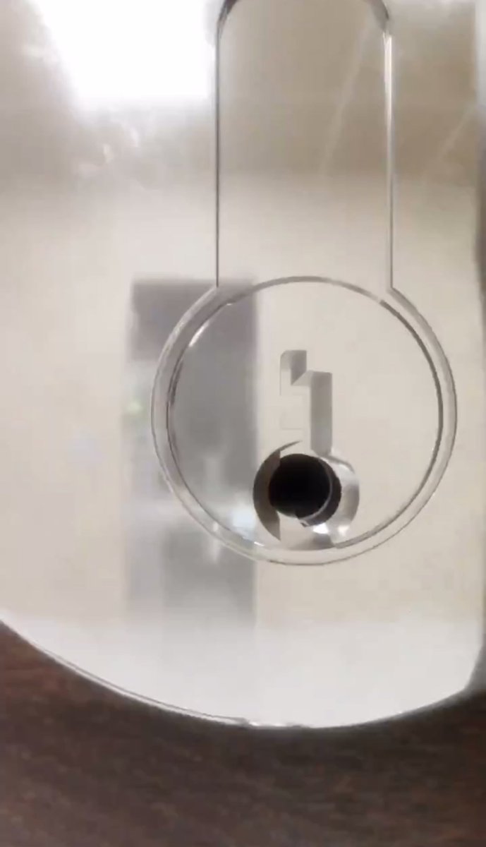 Knapples1213's tweet photo. Anyone else notice you can see the open door of the across from TTPD door in the lock? Also when walking down the hall three doors are open on the left while all the doors are closed on the right, the TTPD door in between two closed white doors. #TTPD #TSTTPD https://t.co/5DI8AuDyoq