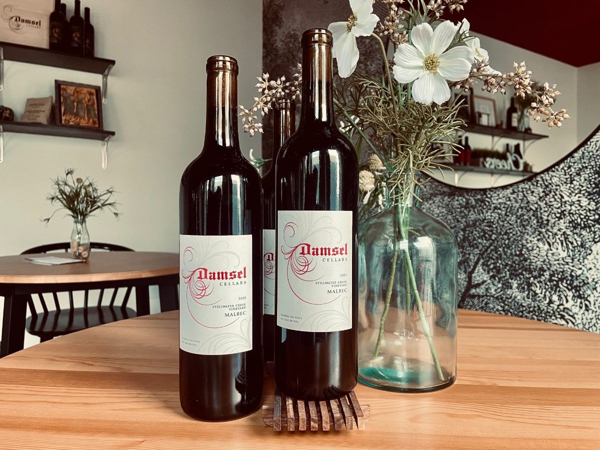 Meet your new BFF when preparing dinner over open flames 🔥 while grilling or camping🏕️! To celebrate #MalbecWorldDay we’re making our 2020 Damsel Malbec available to our fans seeking a dark and daring companion to outdoor adventures: damselcellars.orderport.net/product-detail… ⁠#wawine