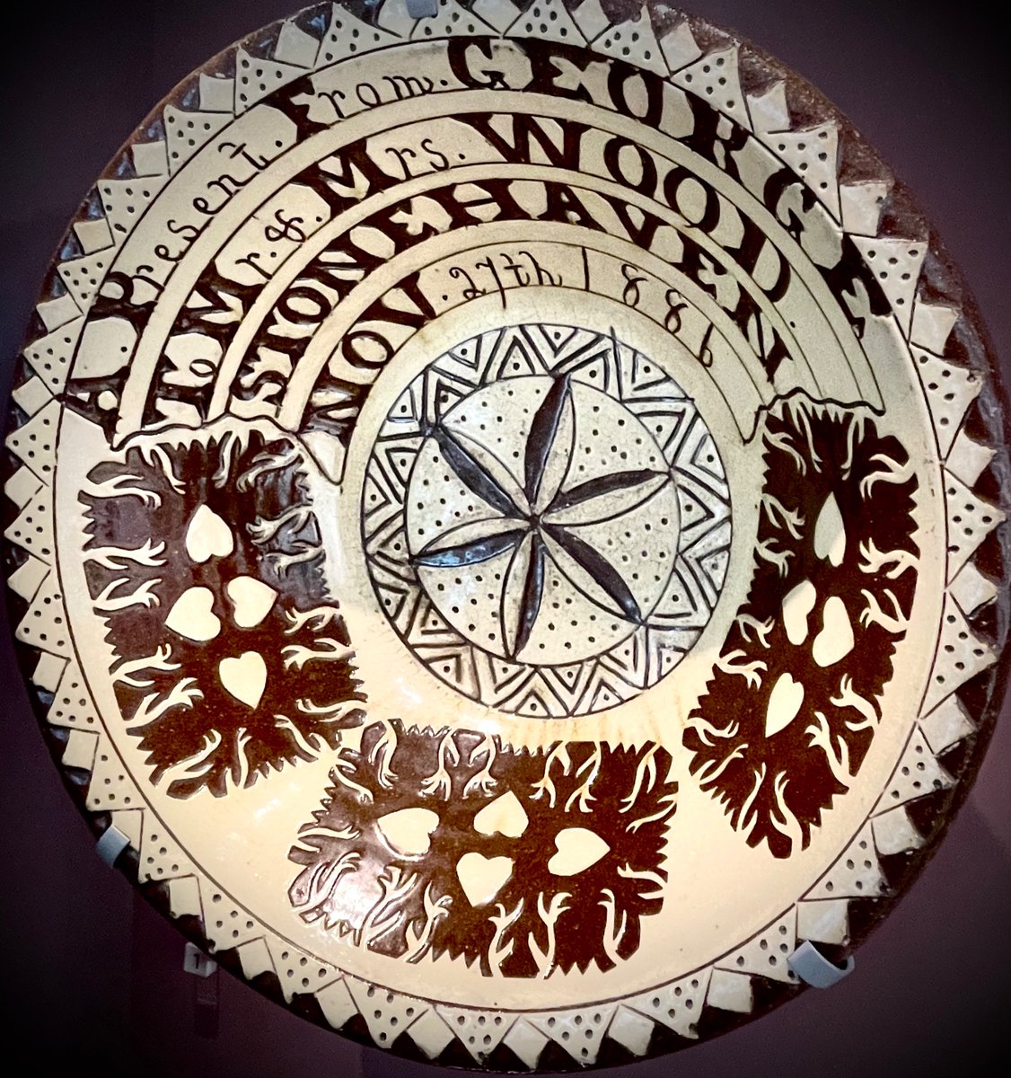 A dairy bowl gifted to Mr and Mrs Wood of Stonehaven in 1886, in hope that neither milk nor marriage ever turned sour. Made by Seaton Pottery. Aberdeen Art Gallery.