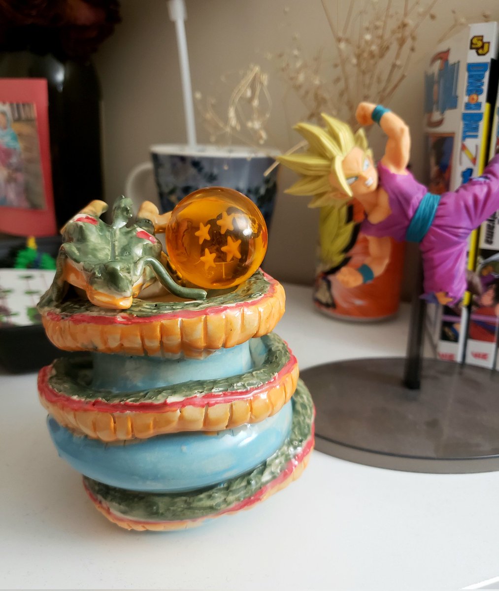 I made Shenron during an 8 week pottery course. He may be a little sloppy (I had to rush him) but look how cute he is!