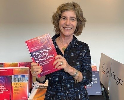 Jane McPherson, co-editor of the book #HumanRights in this Age of Uncertainty, at the <a href="/SpringerSW/">Springer Social Work</a> exhibit at #ECSWR2024 in Vilnius! Interested in reviewing the book's contents? Check out the print copy at our exhibit! <a href="/UGASocialWork/">UGASocialWork</a> bit.ly/441EhNE