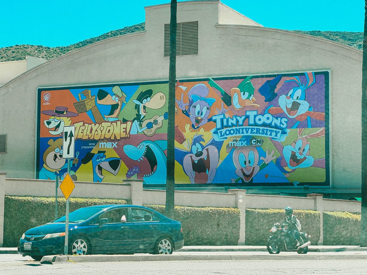 'JELLYSTONE!' and 'TINY TOONS LOONIVERSITY' on a huge billboard at Warner Bros.

📸: @JENNIZZLES