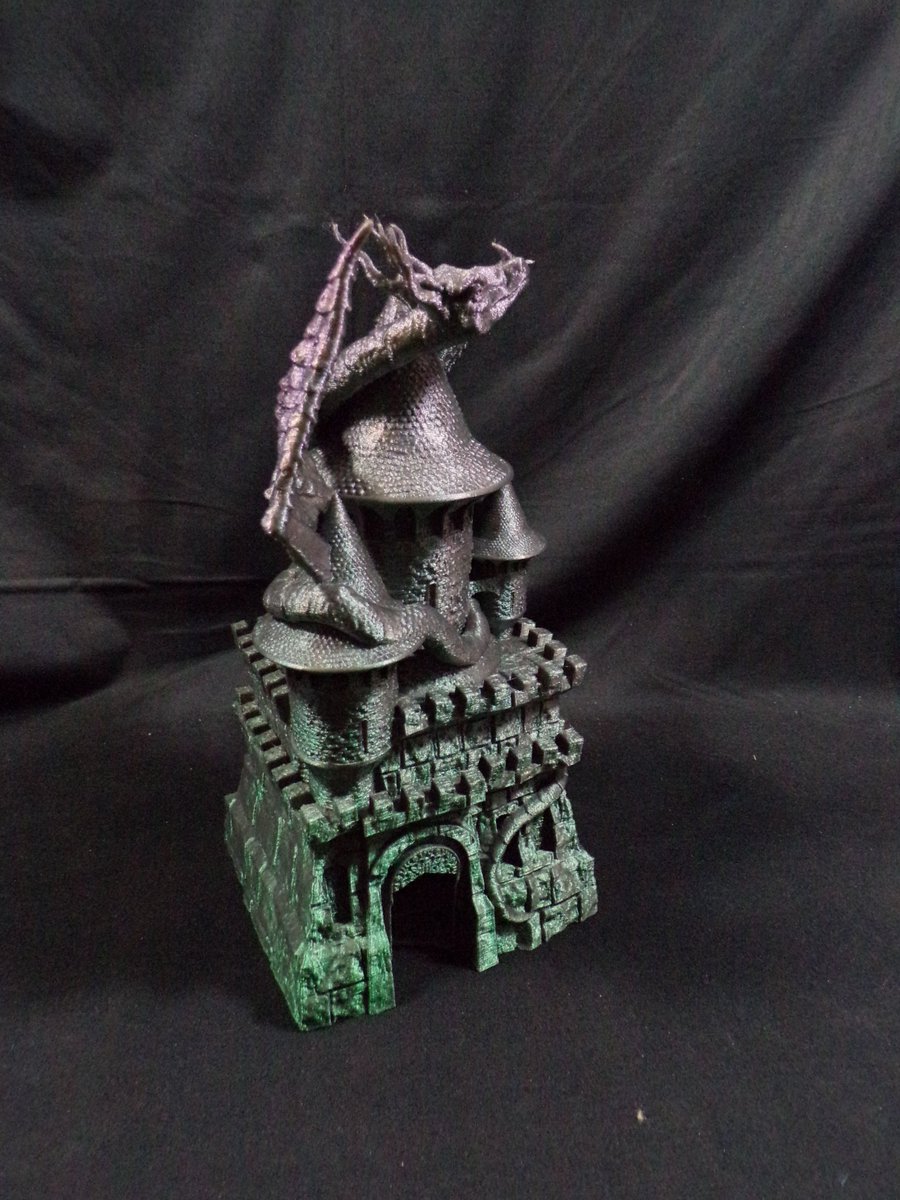 This is, by far and away, one of my favorite towers from @FatesEndGames .  I swear I'm going to print them all and need a bigger house to live in.  And this purple to green PLA is gorgeous.
If you 3d print and need stuff for your games? Hit them up! #dnd  #dicetower