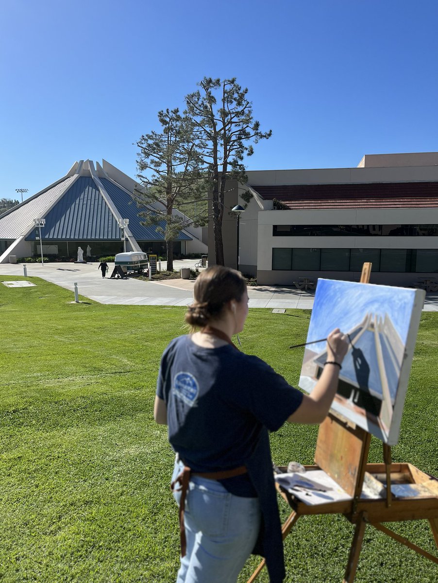 Seeing double? 👀 While strolling on campus, we caught this moment of undergraduate graphic art major Natalie beautifully capturing the CU Center on a sunny day. Join us on campus for upcoming arts events in the CU Center before its upcoming renovation! bit.ly/3MIV9zc