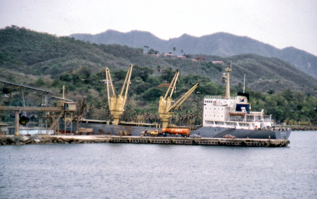 The Venezuelan bulk carrier VENCEMOS VI seen here @ #Pertigalete in 1984. Built @ #Ube for Transporte Industrial SA of #LaGuaira in 1980. Scrapped @ #SantoDomingo as MALICIA in 2012.