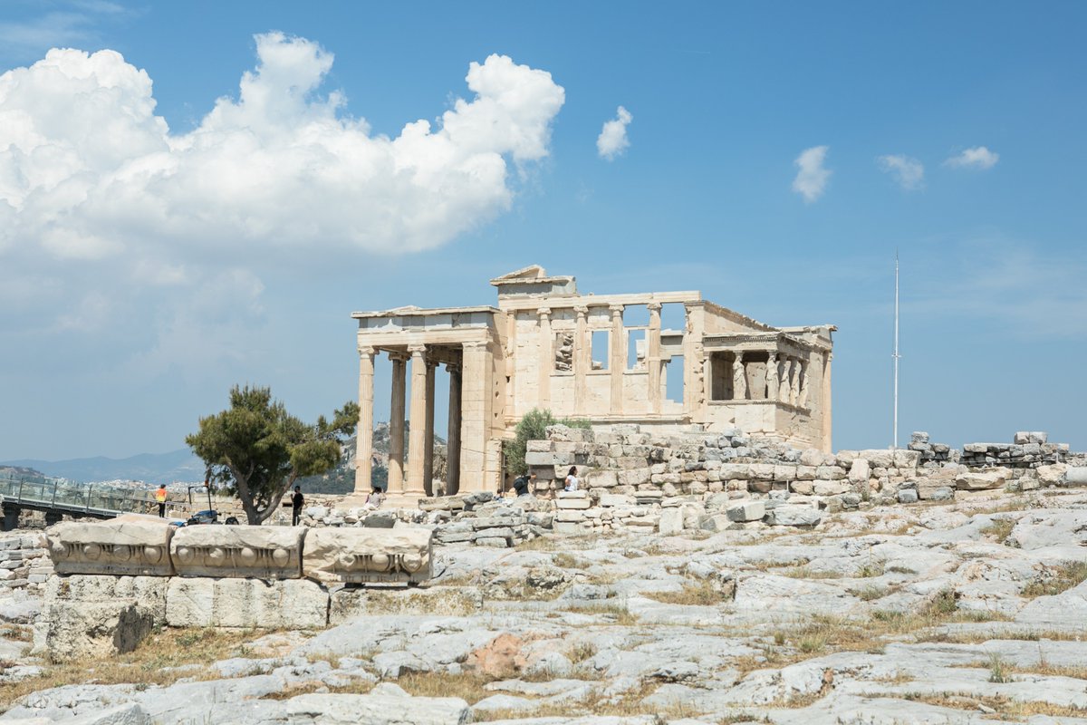 The Erechtheion was built on the north side of the Acropolis, near the Parthenon, between 421 and 406 BCE, during the Golden Age of Athens under the leadership of Pericles. The temple was dedicated to both Athena Polias, the city's patron goddess, and Poseidon-Erechtheus, the