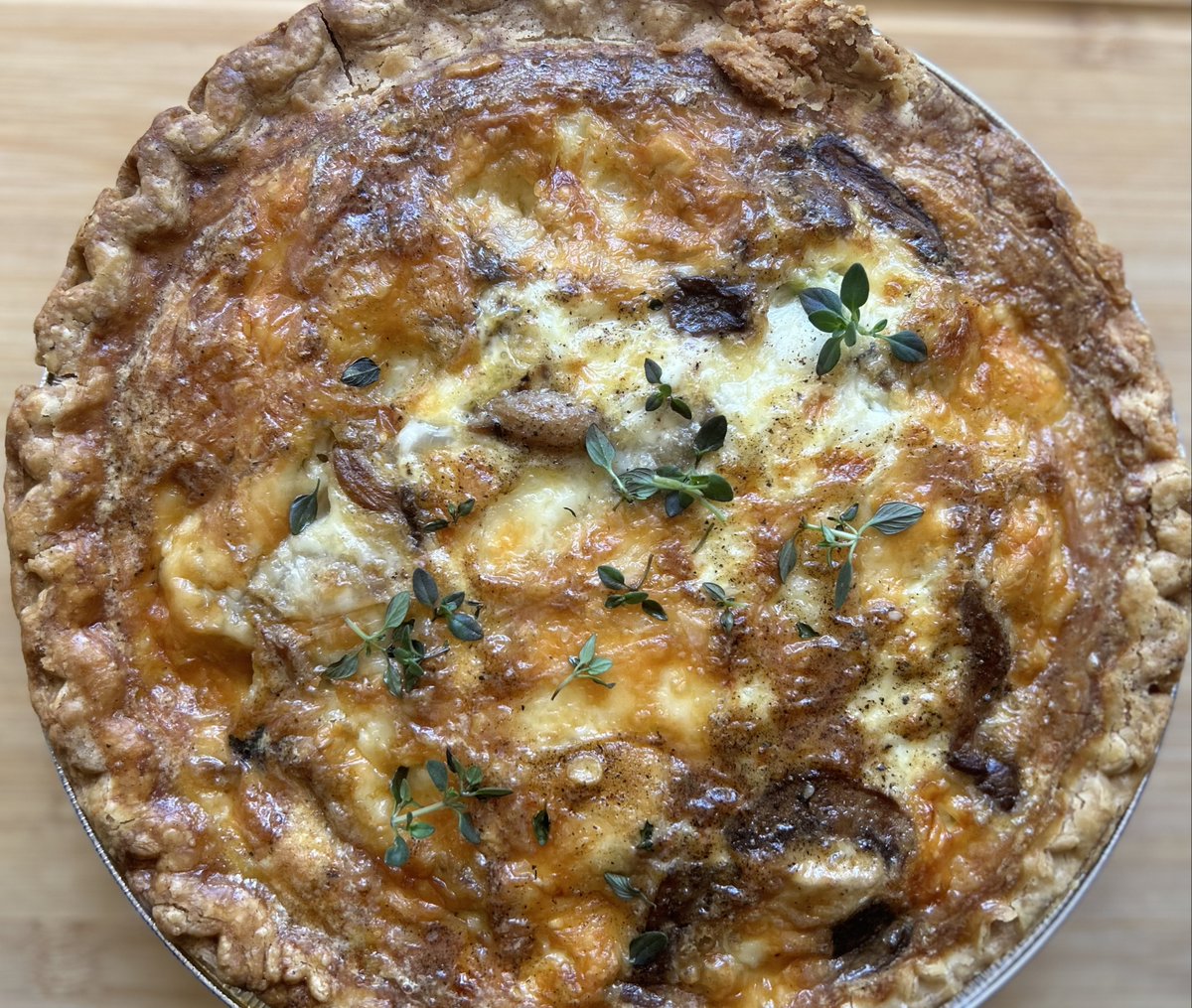 just made a cheesy mushroom quiche thankful for frozen crusts