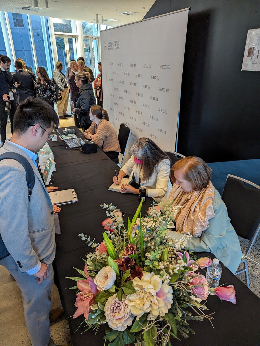 Authors @BecStrating and @JoanneEWallis signing their new book GIRT BY SEA: RE-IMAGINING AUSTRALIA’S SECURITY at the @NSC_ANU’s National Security Conference #SecuringOurFuture. GIRT BY SEA is out now – buy your copy online today. ow.ly/q87E50RhJQv