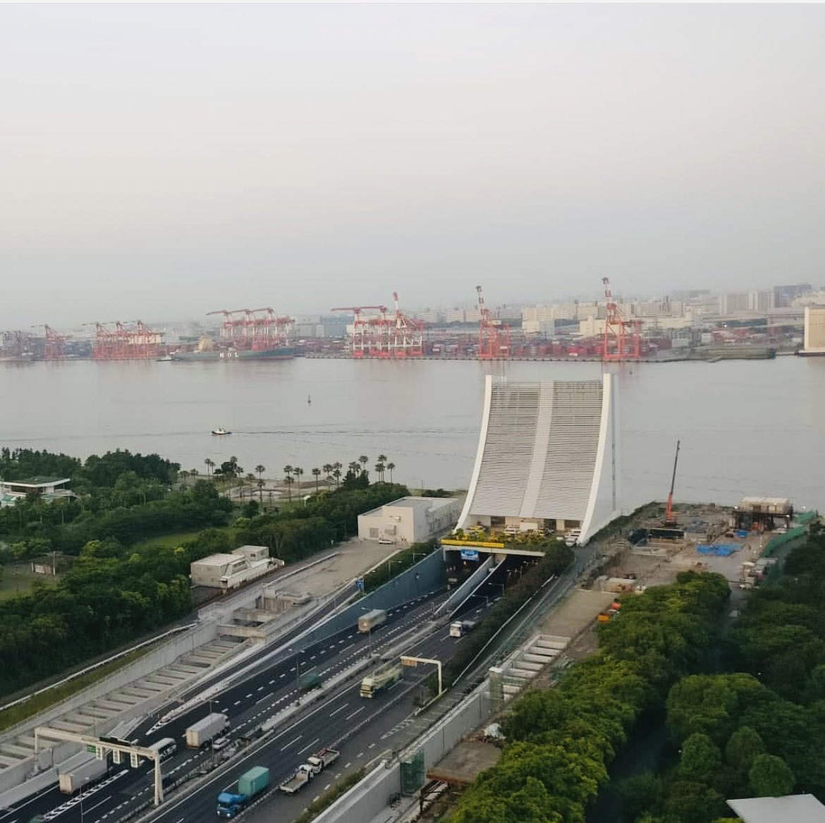 Share an intriguing travel photo taken through a window - from a train, bus, plane or hotel window. A view from the #GrandNikkoTokyoDaiba hotel of the spectacular Tokyo Bay. #Japan