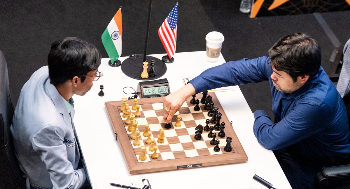 ChessbaseIndia's tweet photo. Hikaru Nakamura joins the lead at Candidates 2024! He played a phenomenal game with the Black pieces to take down Praggnanandhaa in the 11th round.

Pragg played 1.d4 today, and Hikaru went for an early Queen exchange. The resulting Queenless middlegame was very complex - and slowly Hikaru started putting pressure on Pragg, getting a small edge.

Pragg was holding up well till a point, but low time on the clock must have played a role as he made a 29. Ke3? Hikaru found 29...Nd5+ and with a series of very accurate moves, gained a winning advantage. He won a full piece and went ahead to win comfortably.

With this win, Hikaru Nakamura joins the lead scoring 6.5/11 points. He has the White pieces against Alireza Firouzja in Round 12.

Photos: Michal Walusza, Maria Emelianova 

#chess #chessbaseindia #candidates2024 #gmhikaru