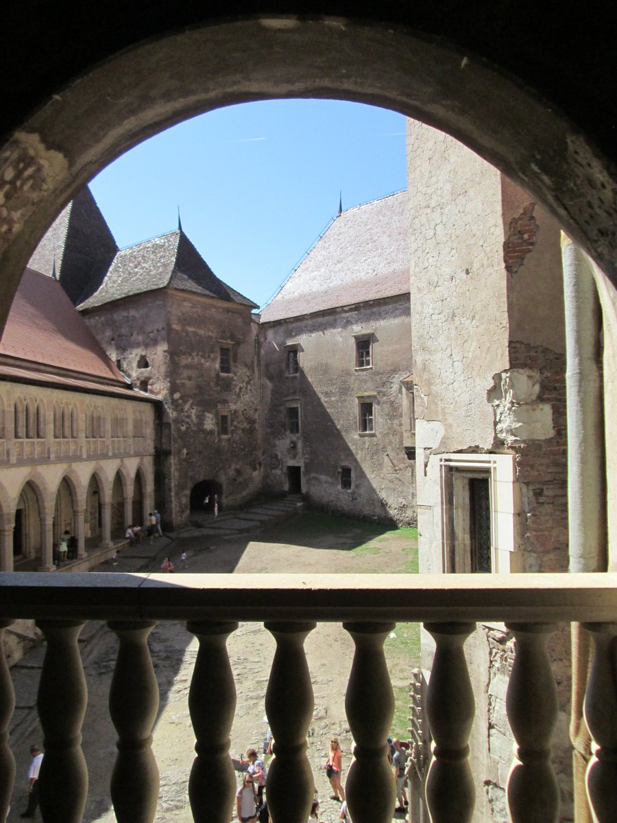 🏰I'm taking you with me to Corvin Castle, #medieval #Transylvania. We took shelter in the cool upper balcony, by the Queen's room. Look, down is the Quadriporticus, the courtyard surrounded by colonnaded porticoes. #AlphabetChallenge #weekQ #Im4Ro #architecture #travelphoto