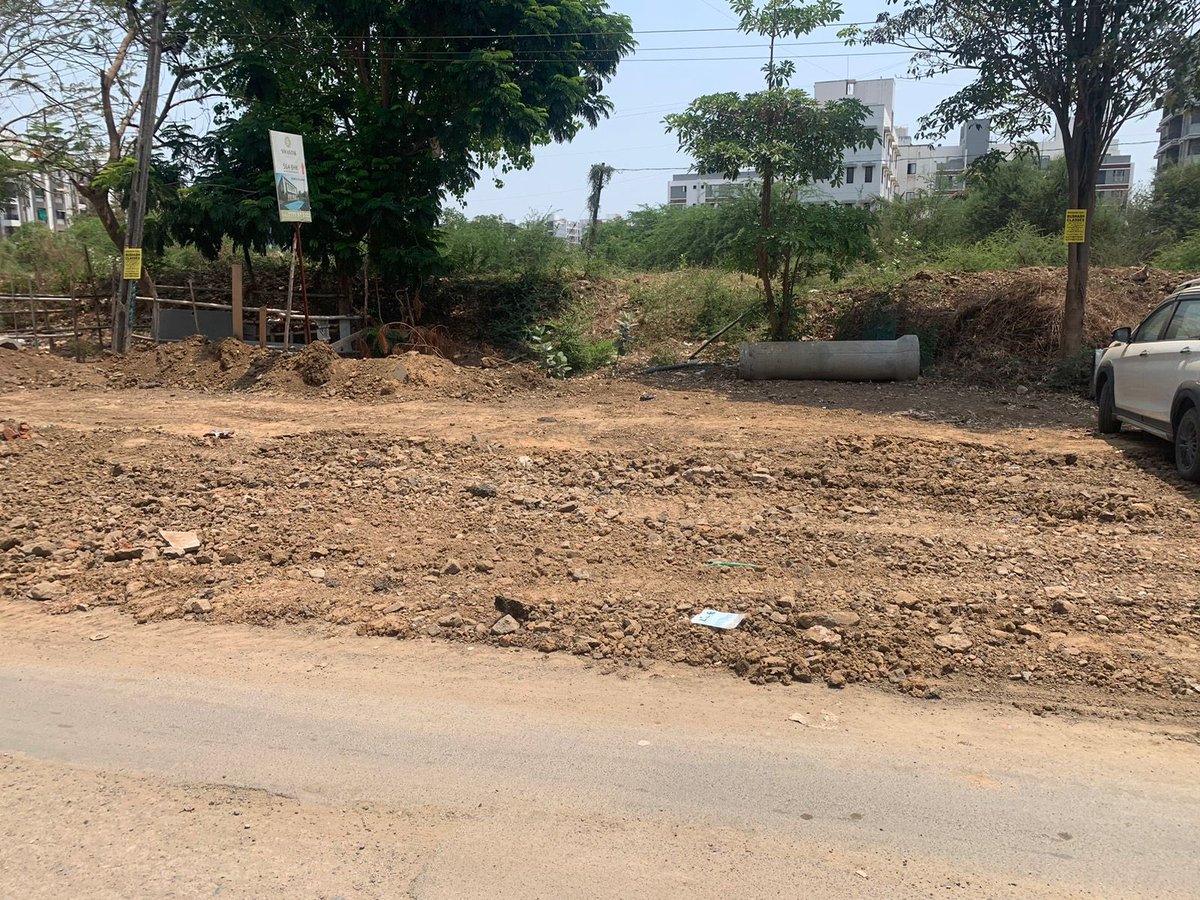 naman_dave's tweet photo. @VMCVadodara Thank you. Between Labh bunglows &amp; Prayosha heights, in front if Dream Meadows bunglows, JCB came &amp; fix some of potholes. But in future, due to water again same potholes will be ther. So, requesting to treat sand area with pouring water. 
Again thank you so much for quick actions https://t.co/TqPJ44plVc