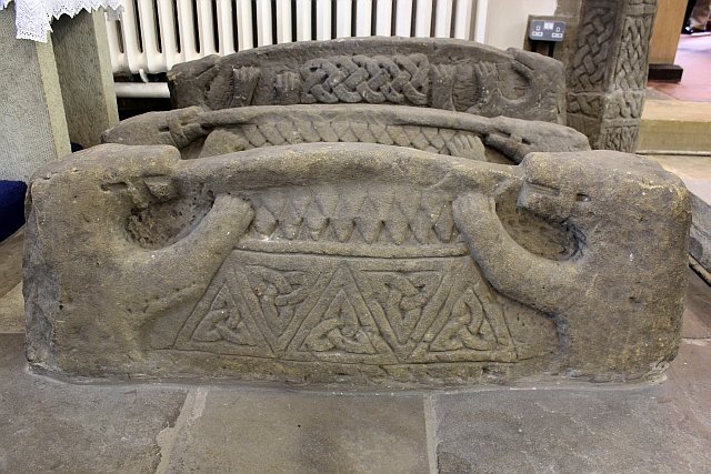 Some of the finest examples of hogback stones in the country are in the Church of St Thomas, Brompton near Northallerton. The carved probably Anglo-Scandinavian grave covers date to around the 9th-10th century. These three examples show muzzled bears at each end as opposed to