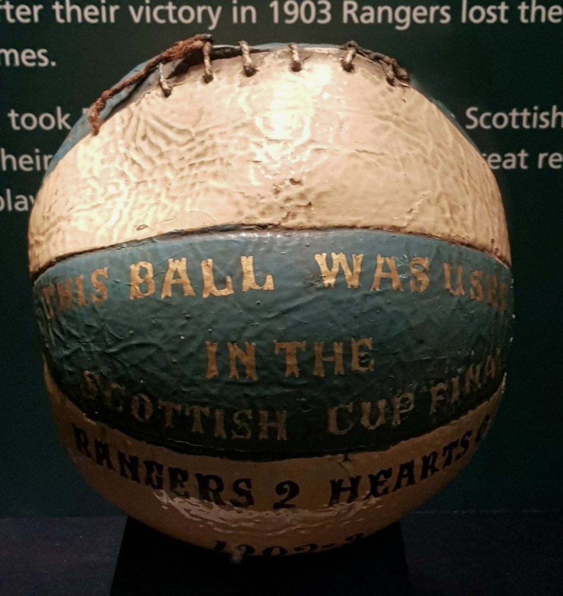 🗓️ #OnThisDay 1️⃣9️⃣0️⃣3️⃣ : #Rangers win our 4th Scottish Cup, beating Hearts 2-0 in a 2nd replay, all 3 matches were played at Parkhead. Alec Mackie & RC Hamilton scored. We played with 10 men after Jock Drummond went off injured.[📷 The match ball is displayed at @SFootballMuseum]