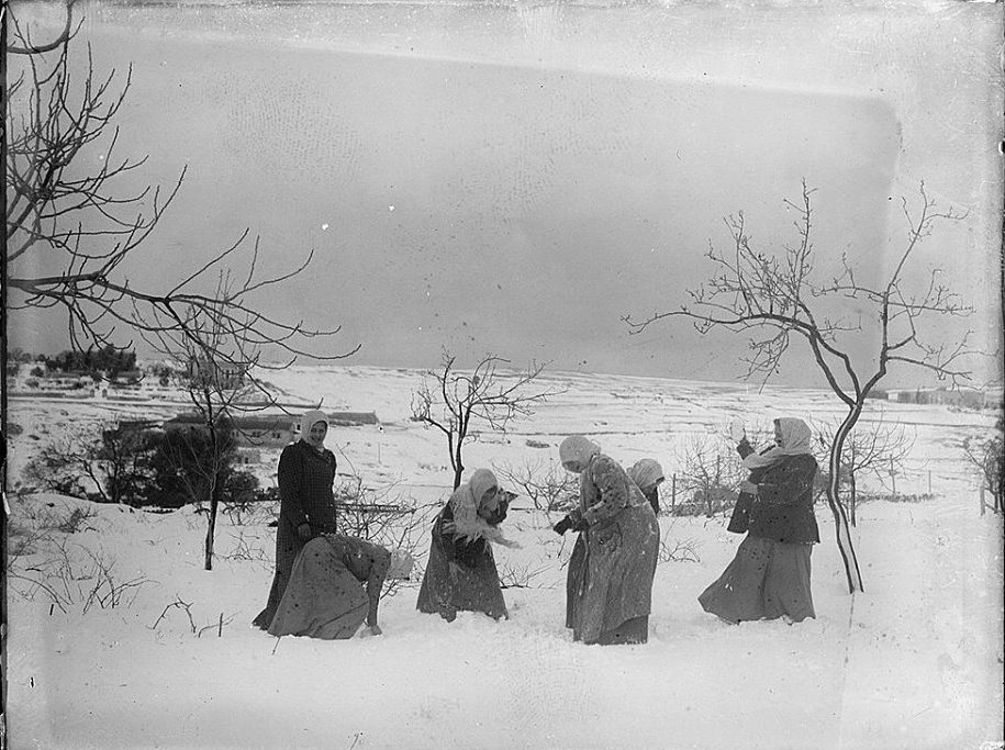 Palestinian women in the snow. Jerusalem, ca. 1921.
