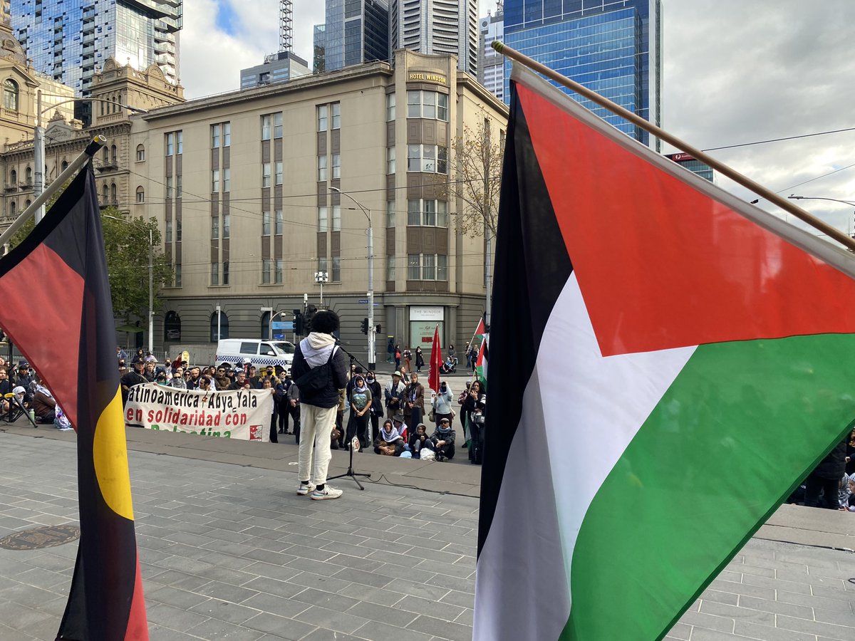 “Free the people, free the land. Liberation, we demand” people chanting as they walk to state library during the anti-war protest in Naarm/Melbourne