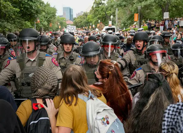 When these freaks were chanting 'Jews will not replace us' in Charlottesville, there wasn't a cop in sight. You can be sure we're seeing a genuinely anti-racist movement here because it's swarming with cops who are gleefully beating the protesters to a pulp.