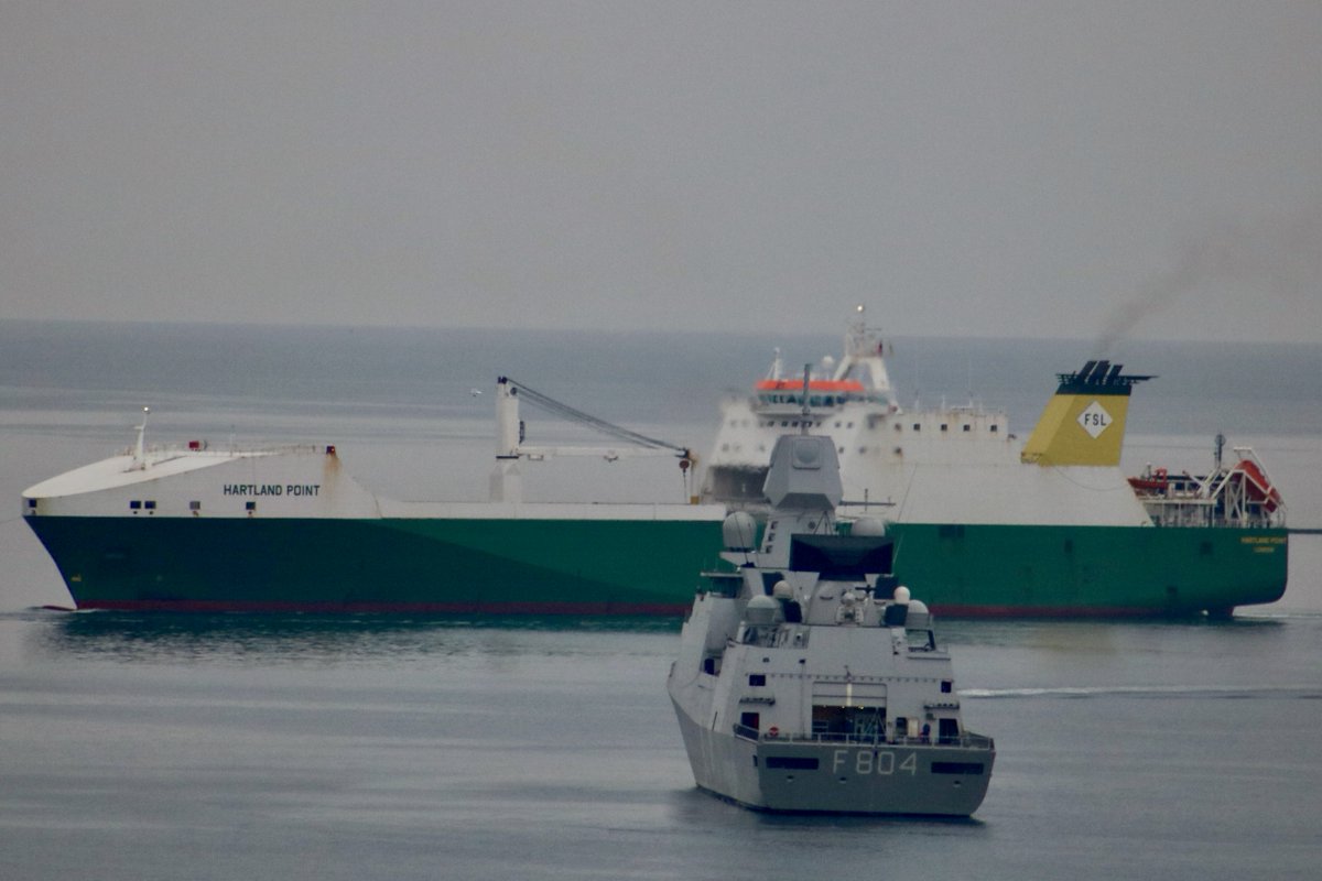 Rockhoppas's tweet photo. Early morning visit to Plymouth of the HARTLAND POINT on its way into Devonport. The Ro-Ro Cargo Ship is a roll-on/roll-off sealift ship. Passing the Dutch warship HNLMS De Ruyter and @RFAProteus at anchor at Breakwater earlier this morning.
https://t.co/pLuXXL8dXG https://t.co/l5krHupx9e
