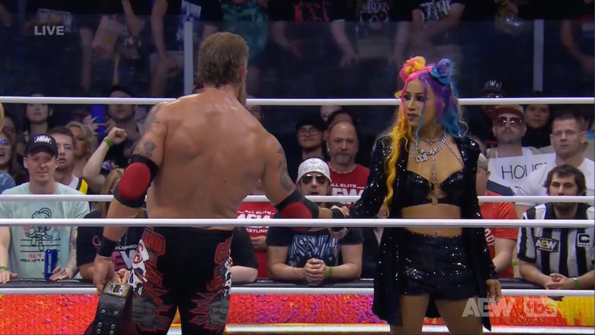 BRWrestling's tweet photo. Adam Copeland 🤝 Mercedes Moné https://t.co/wmRN0NZC7l