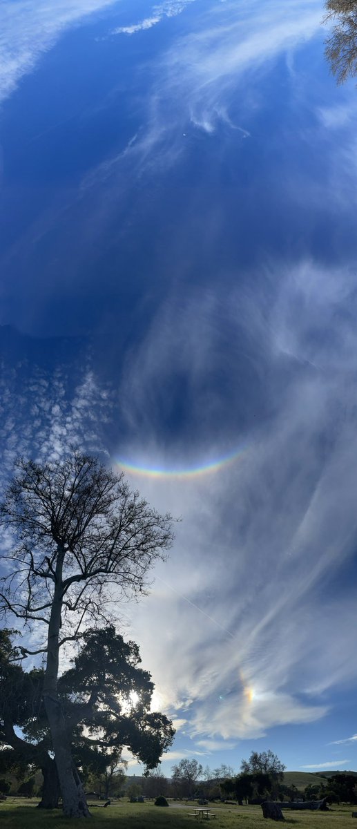 kyleconnect's tweet photo. What’s going on here? This ring of rainbow with a focus point is amazing, beautiful, and like nothing I’ve ever seen before 😳 
#aliens #rapture #Cloudseeding #cool #rainbow #nofilter #wtf https://t.co/6MB3nEQUaj