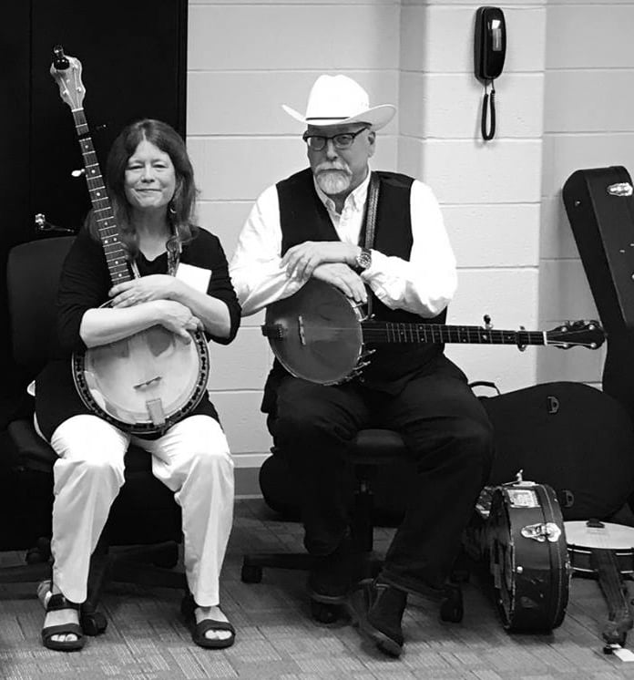 Thinking about my dear friend Cathy Barton Para, gone five years today. She was one of the greatest people I have ever known, and oh, what a natural born musician. We had known each other since high school. Here we are at Midwest Banjo Camp in 2017. (Photo - Shari Ballard)