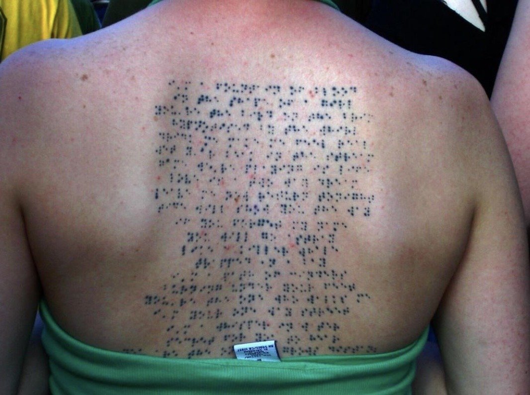 Björk's "Bachelorette" song lyric written in Braille seen tattooed on a woman’s back at a Modest Mouse concert in Toronto (2011)

Photo. by Nadia Prigoda-Lee