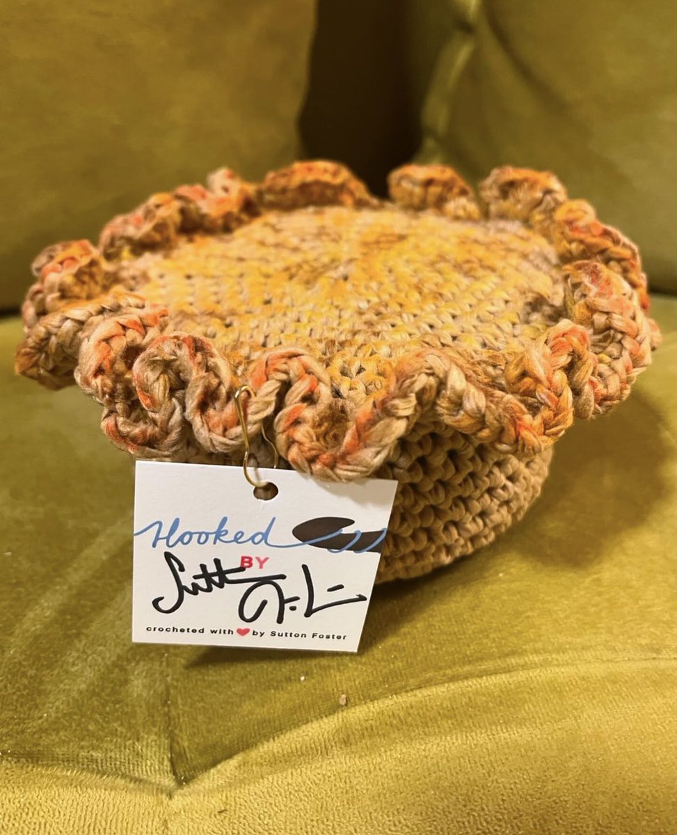 THEY’RE GOING TO AUCTION CROCHETED MEAT PIES MADE BY SUTTON HERSELF STOP THAT’S ADORABLE