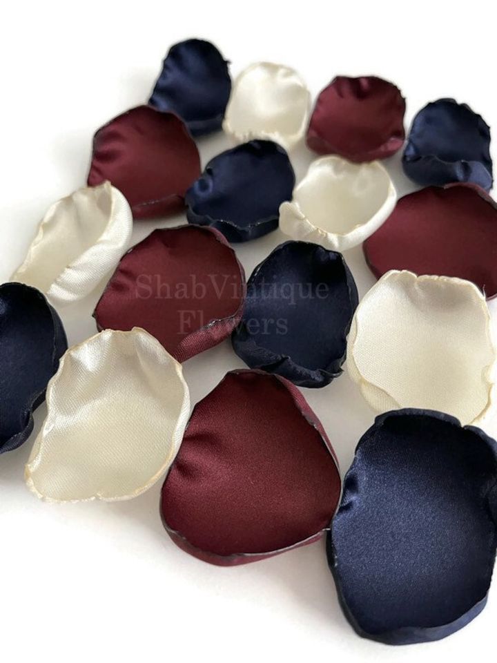 Add a pop of color to your special day with these beautiful burgundy, ivory, and navy blue flower petals from ShabVintiqueFlowers! 🌸 Perfect for… dlvr.it/T5fZg2 #weddings #bridalshower #weddingaisledecor #miniwedding #intimatewedding #bridal #tabledecor #weddingday