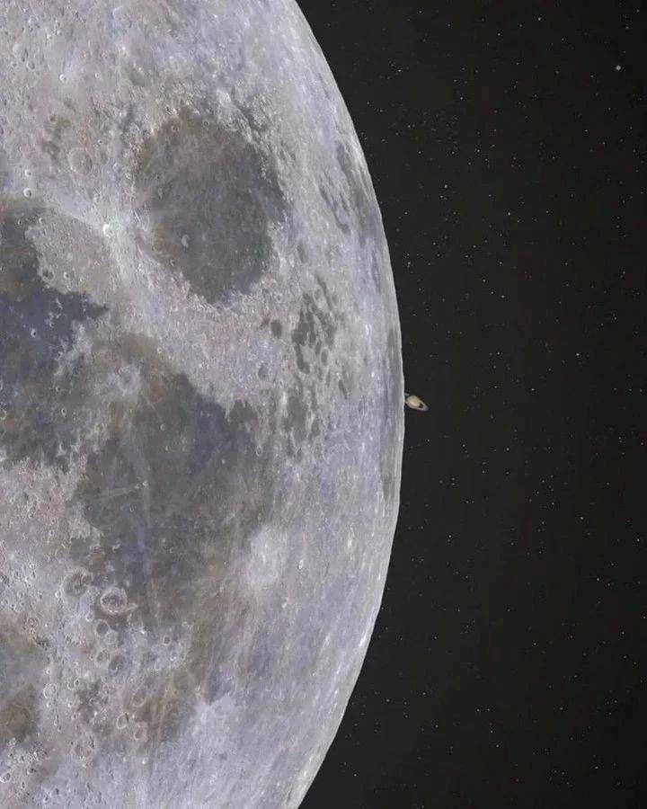 Saturn rising from behind the Moon