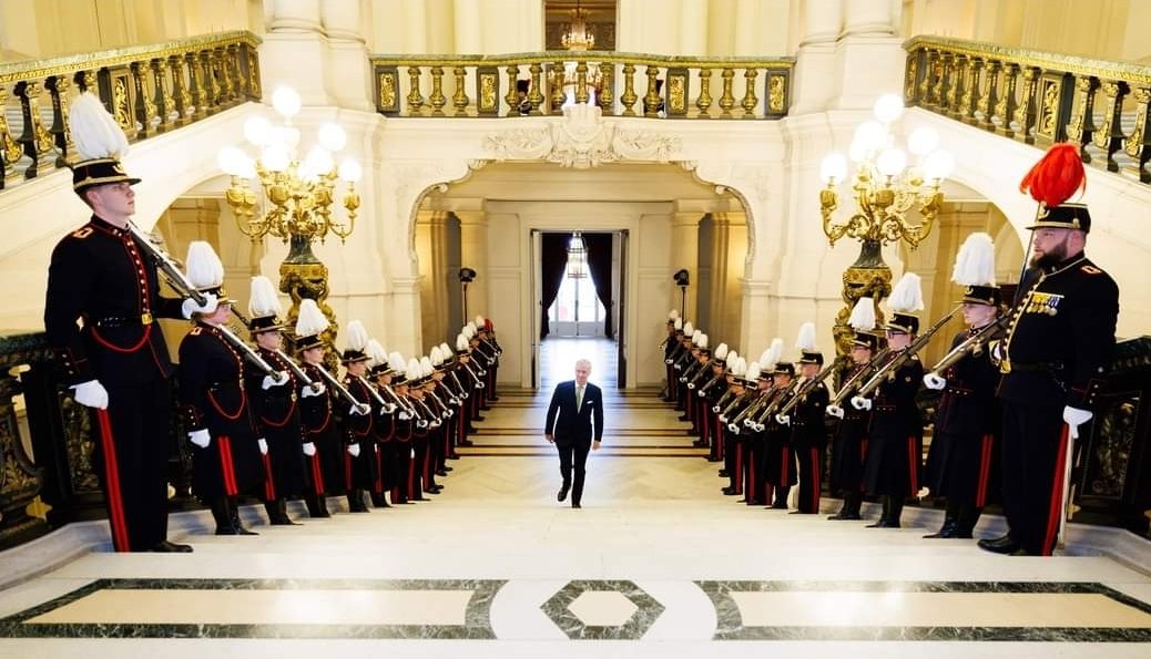 Just the King of the Belgians arriving at his office.