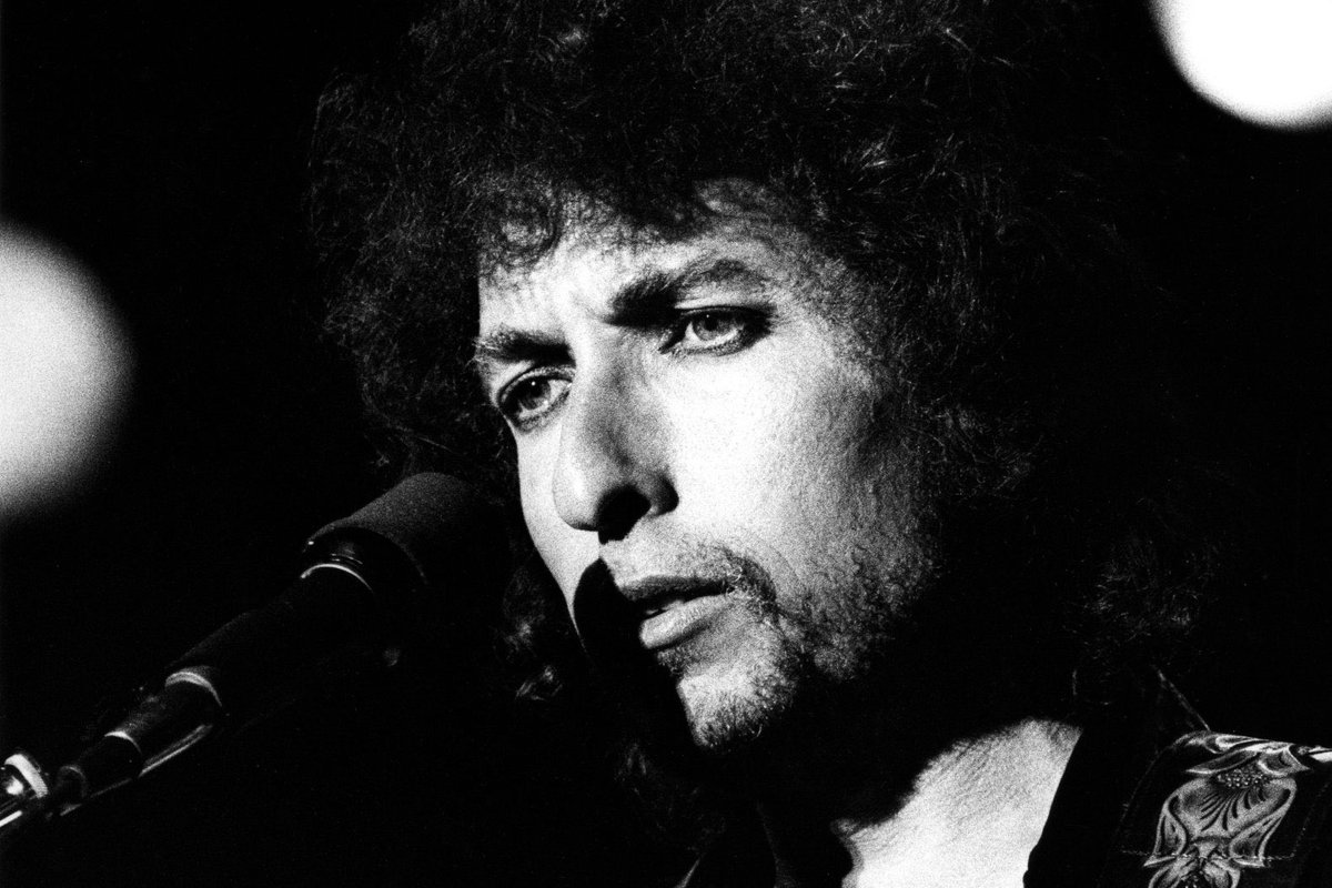 Bob Dylan performs at Feijenoord Stadion, Rotterdam, Netherlands, 1978. 📸: Gijsbert Hanekroot. #BobDylan #Dylan