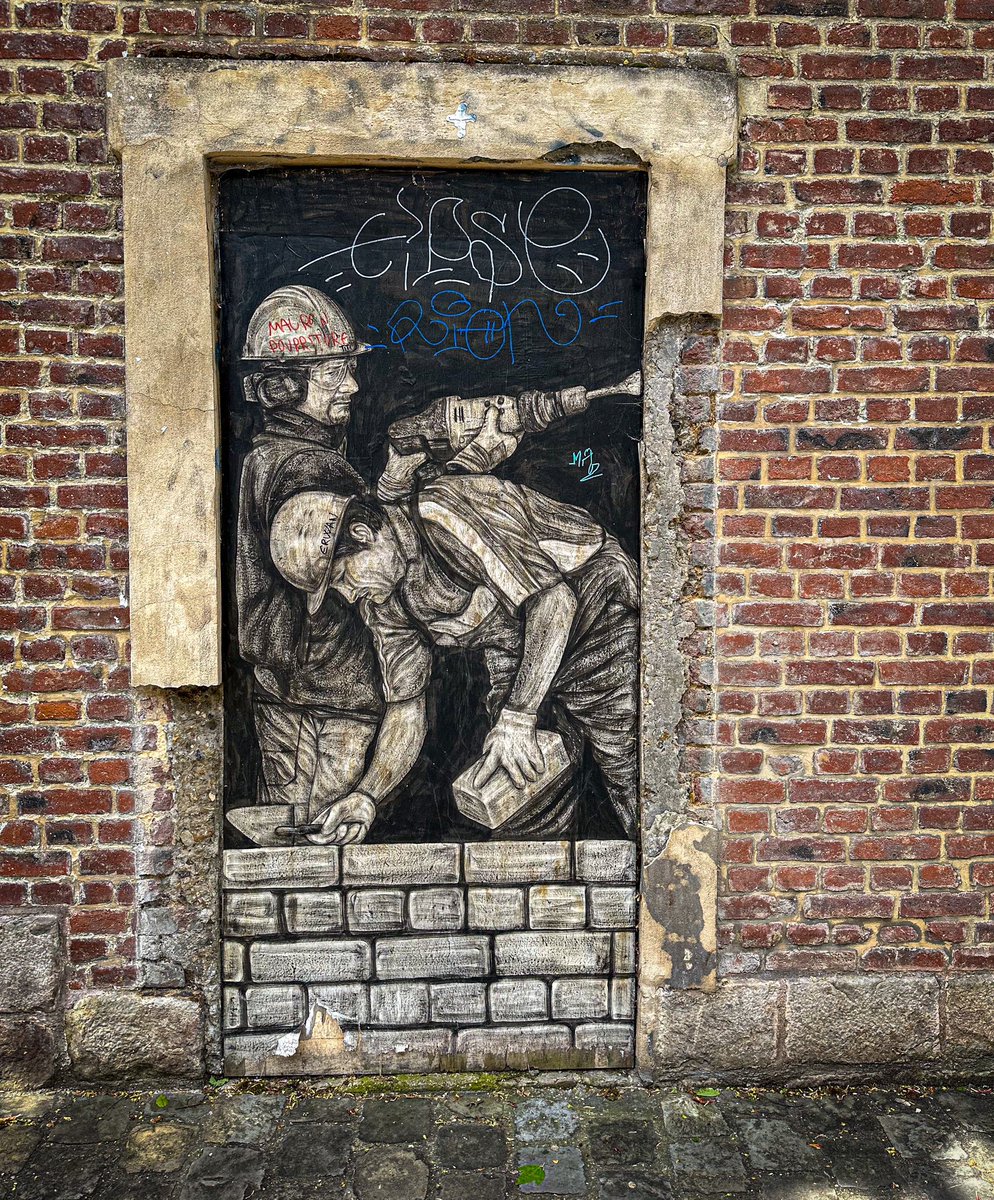 Bricked up door: Amiens, Somme #DailyDoor #AdoorableThursday  #StreetArt