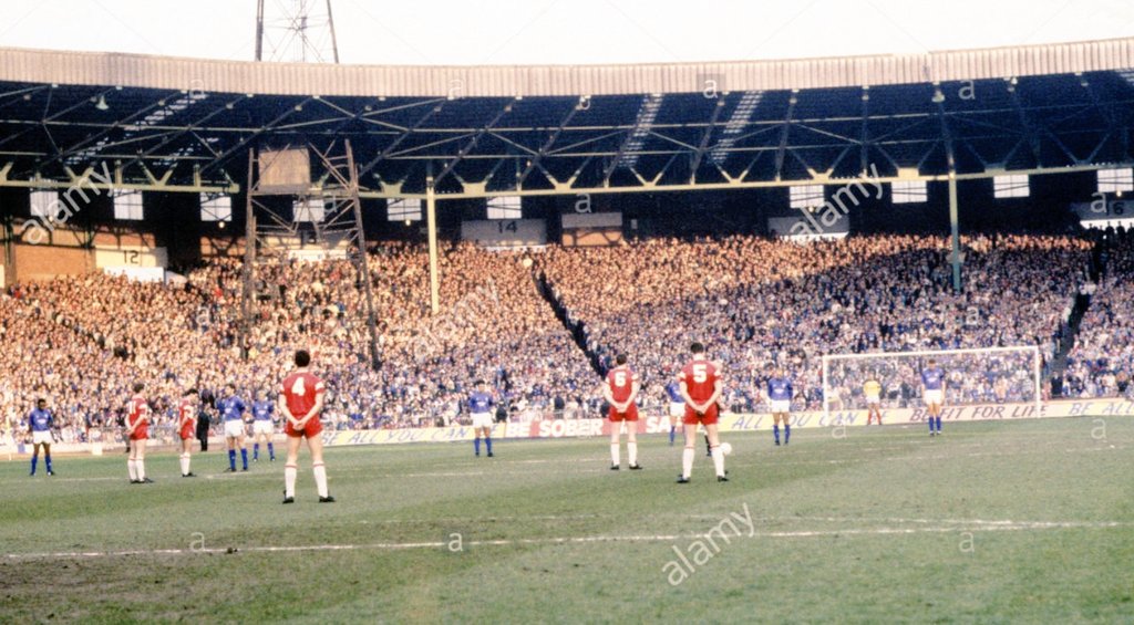 The players of St Johnstone and Rangers stand in silence, as a mark of respect to those lost at Hillsborough, ahead of the Scottish Cup semi-final replay between the clubs on this day in 1989.