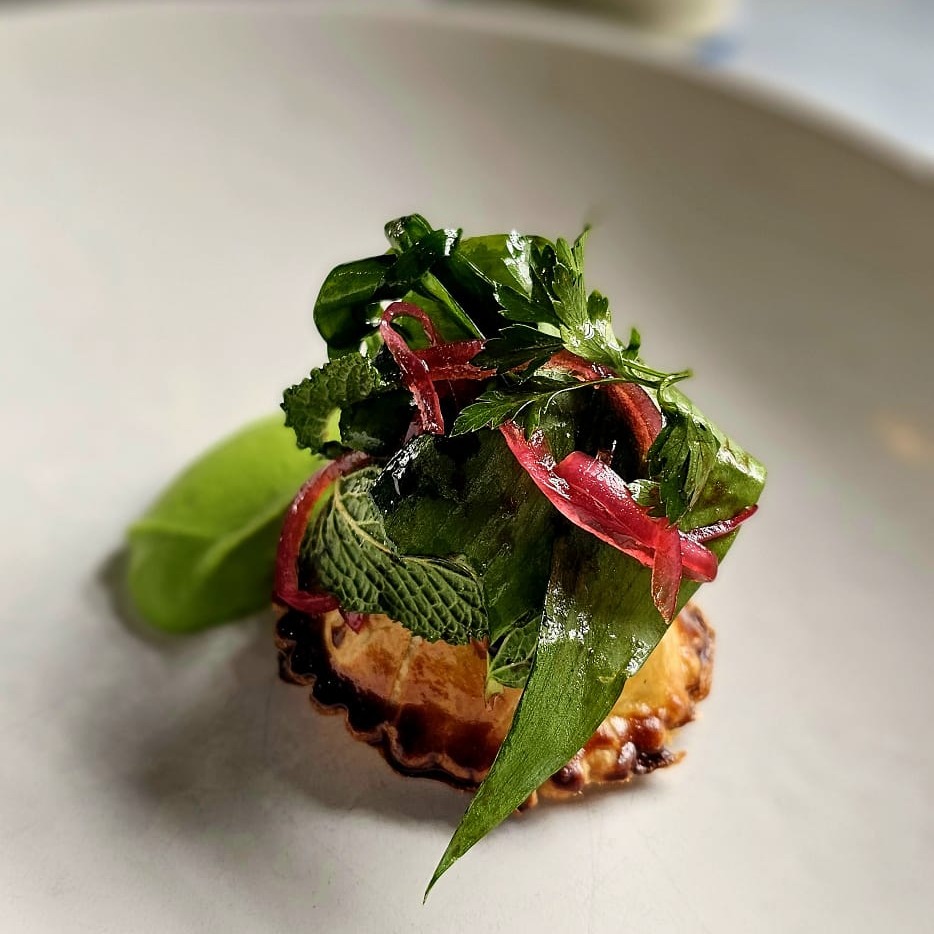 Lamb sweetbread pie: filled with lamb sweetbreads, chicken mousse, black olive, salted anchovy, pancetta and soft herbs. Served with pea pureé and small leaf salad. #foodie #foodporn #gastropub #lunchideas #theunrulypig #bromeswellsuffolk