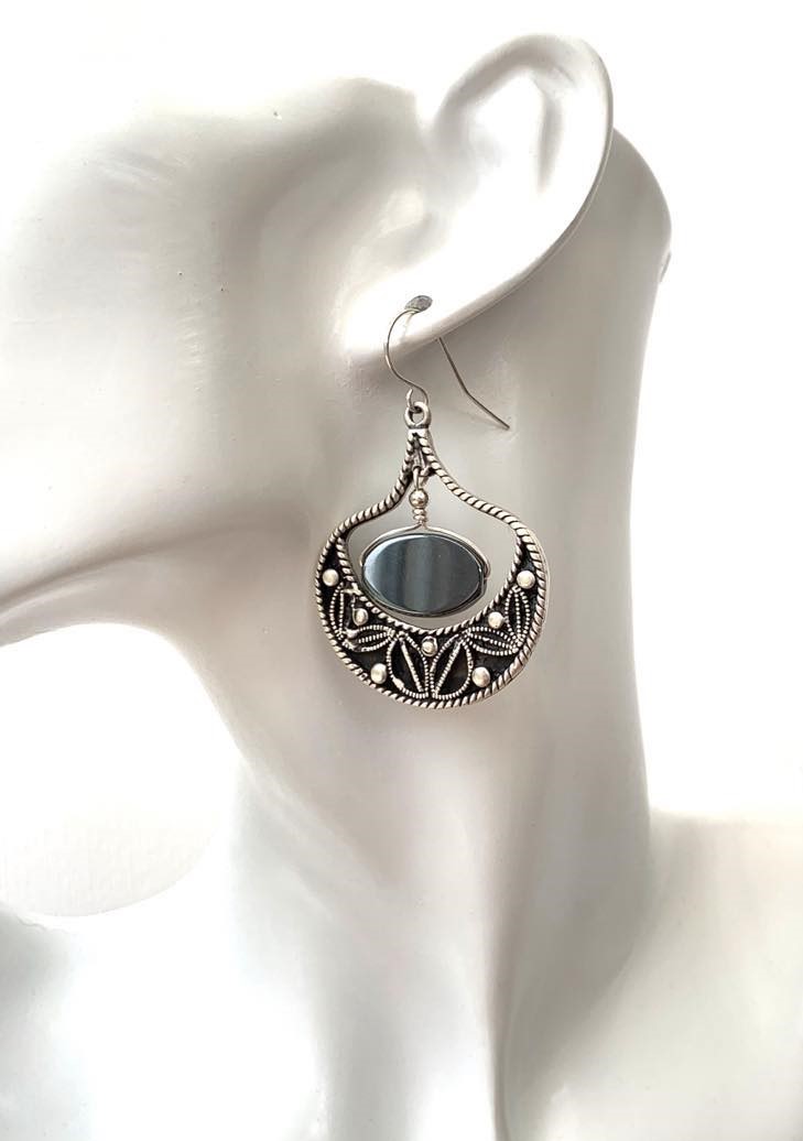 This pair of statement earrings feature Hematite and come with solid 925 Sterling Silver hooks, while the body of the earrings are silver plated throughout. The styling is ethnic/ bohemian. 

Purchase via Etsy: etsy.com/uk/listing/171…

#hematite #blacksilver #925sterlingsilver