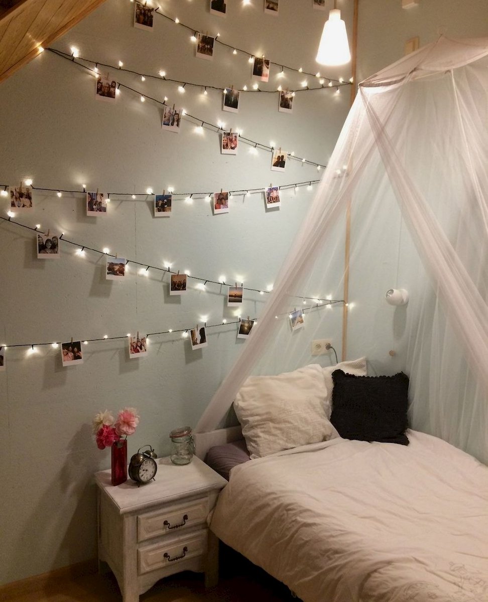 An improvised memory wall with polaroid pictures attached to a string of fairy lights. 📷💡🎞️ Simple, yet cozy and thoughtful! . . . . #cozyhomes #cozyinteriors #cozypillow #homedecor #homedecorating #cozylights #cozyliving #cozyminimalist #homedecoration #homedecorations
