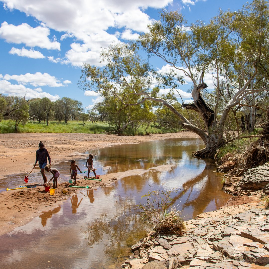 'We take the kids out on-Country. This way, they learn + grow strong in both ways. Martu way + whitefella way.' - Louise, #KJMartuRanger. At the creek, #MartuKids enjoyed hearing stories + language, while splashing about. These trips deepen their connection their culture.