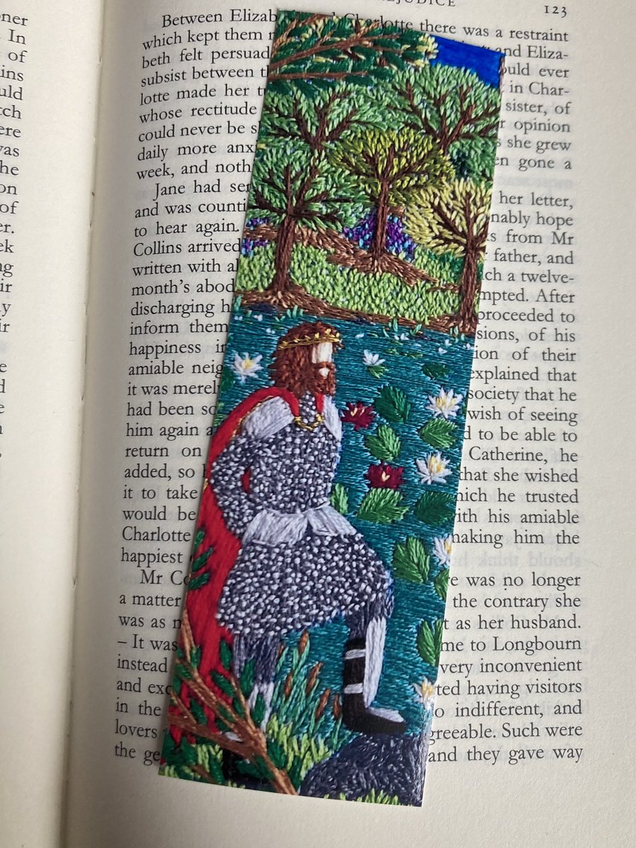 My Bookmark of the day today is… King Arthur. *A photo snippet taken from my recent larger embroidery printed onto glossy card. *link in bio to find this one and lots more… 😉🧵🌿👑📚🔖 #booklove #thesewingsongbird