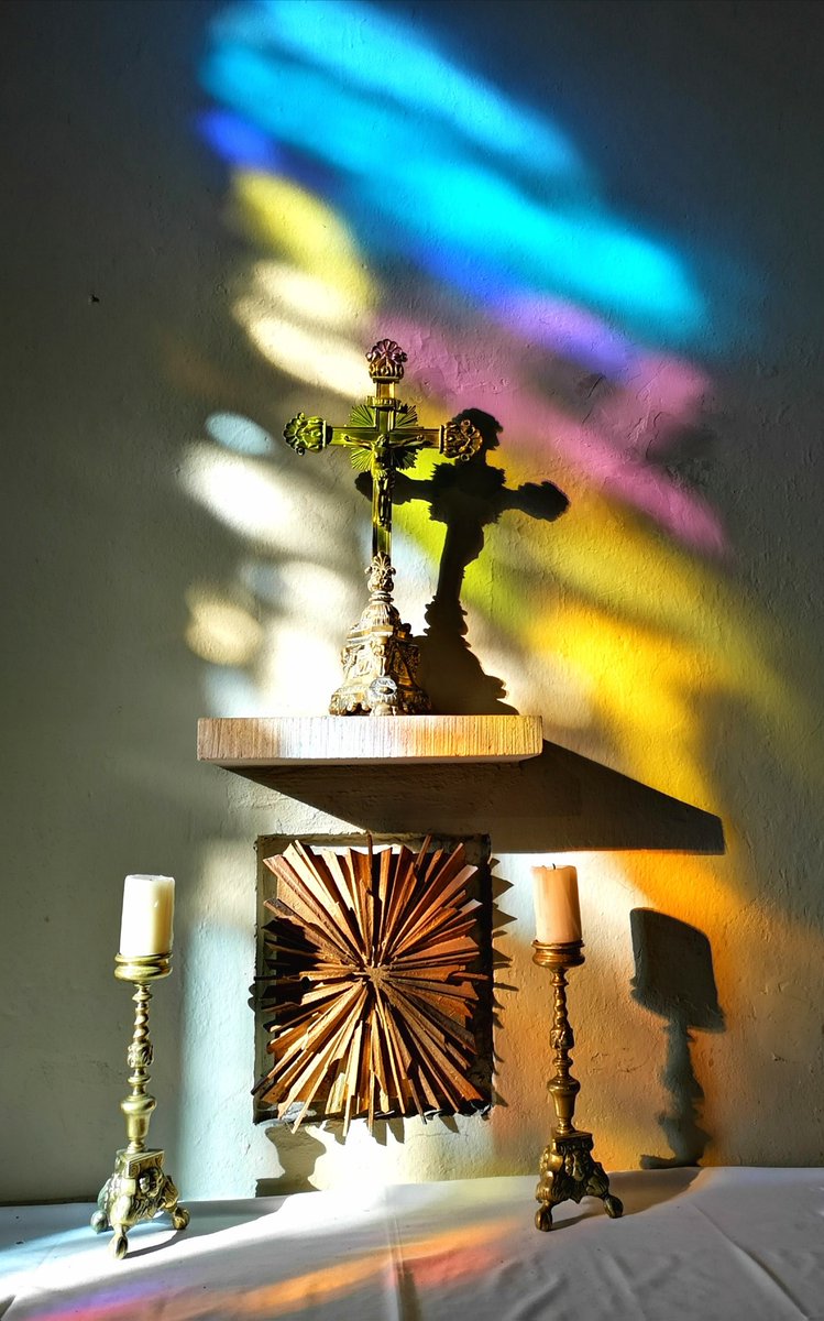 The light coming through the stained glass window in our St Bernard Chapel.