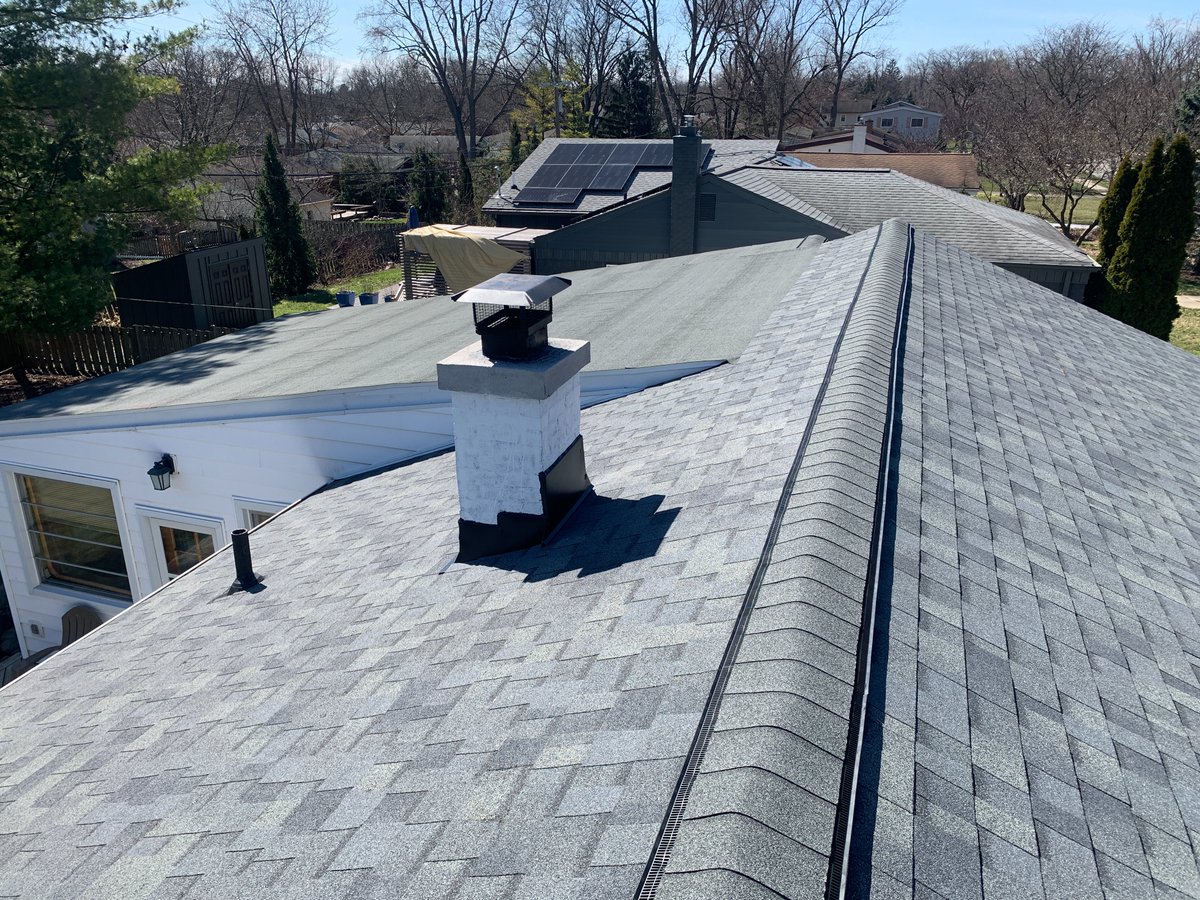 NBHD_Roofing's tweet photo. We replaced this roof in #AnnArbor with the installation of @OwensCorning Duration Estate Gray #shingles, coupled with a 2 Ply Modified system on areas with a low slope. We replaced the #roof decking due to its compromised state, marked by numerous holes and damaged roof boards. https://t.co/YtjG1Ptniw