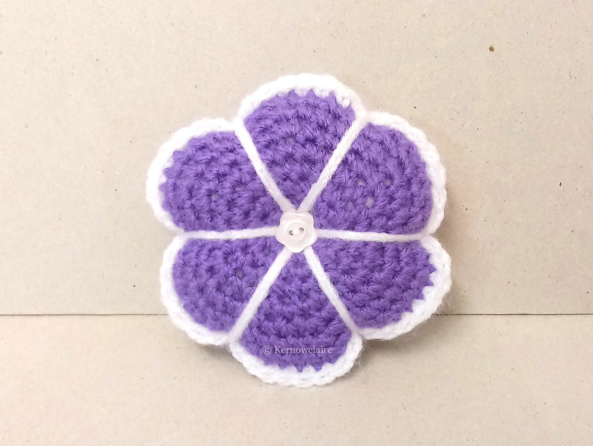 Small flower pin cushion in purple with white edging. Perfect to keep pins safe. #handmadeintheuk #purplepincushion #pincushion #sewingaccessory #madeincornwall #handmadeincornwall #giftforher #sewinglover #newonfolksy folksy.com/items/7961852-…