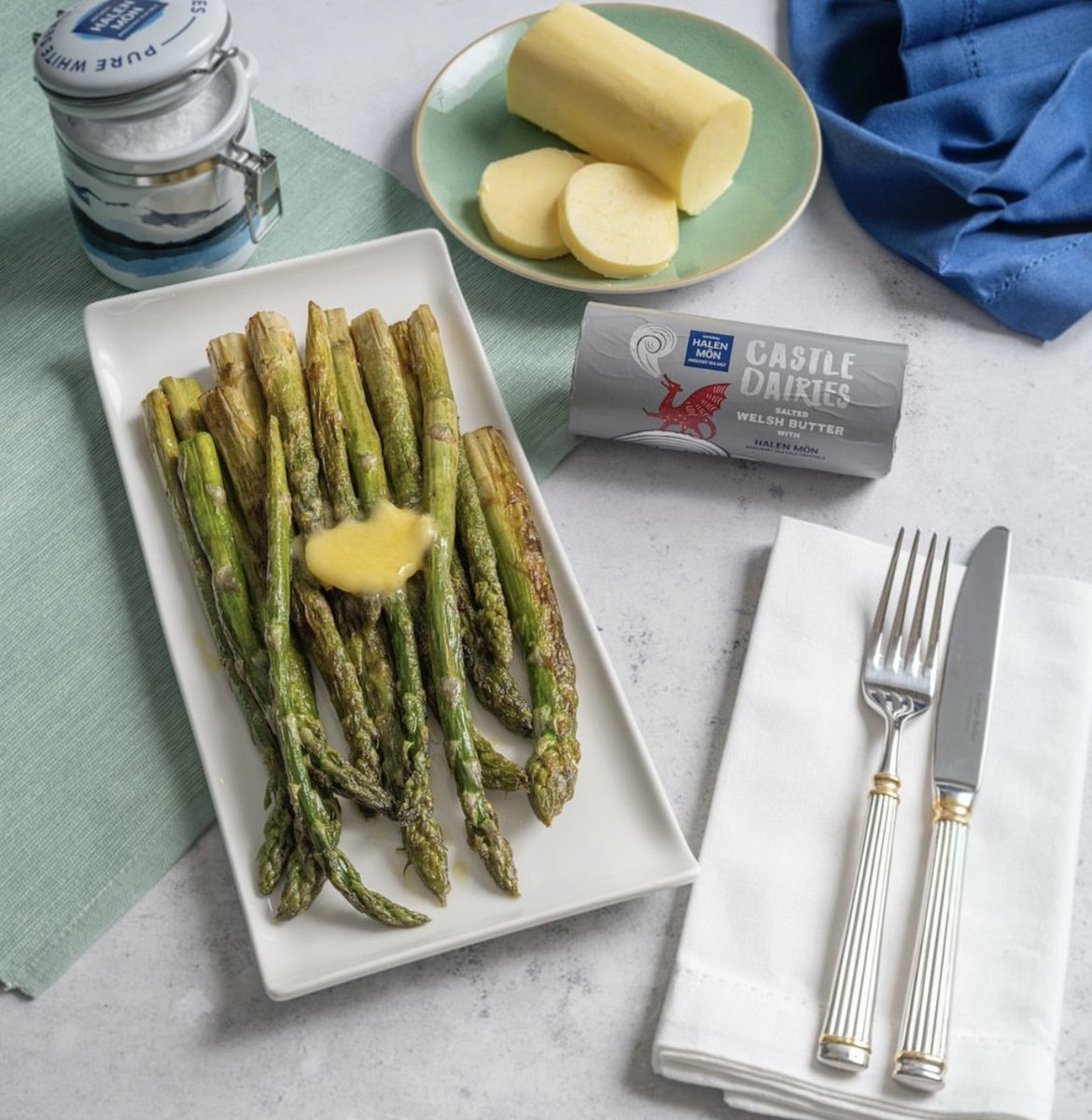 Asparagus season is almost upon us🤗… We love nothing more than to sautée a bunch of asparagus over a high heat, smother with our Halen Môn salted butter roll & top with chilli flakes. It’s the perfect accompaniment to any dish this spring👌🏽🧑‍🍳💋 #castledairies #butter #wales