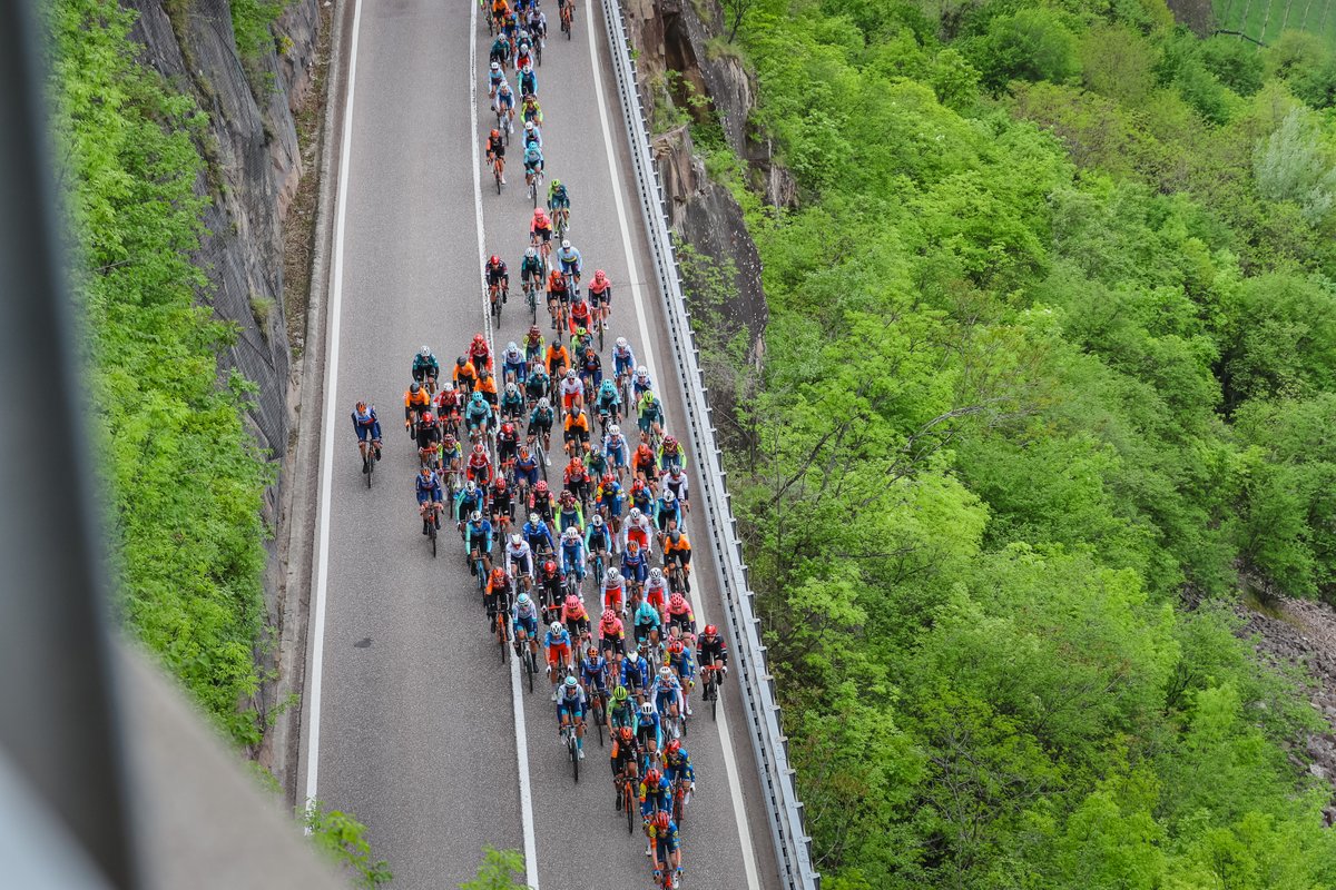 The peloton on the way towards Passo di San Lugano, where #TotA will go from @suedtirol_info to @VisitTrentino 

📸 Vaishar
#LiveUphill