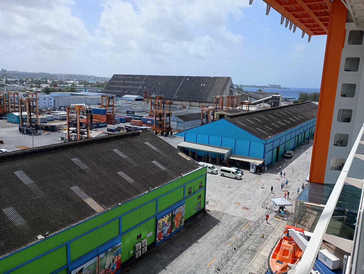 rsmcneill's tweet photo. QFTC Day 9 - Bridgetown, Barbados. Not the prettiest view at the dock, but was interesting to watch the humongous spider-looking lifts carrying cargo containers. But, then we walked into town and scenery was much better! https://t.co/f6SutN9SZS