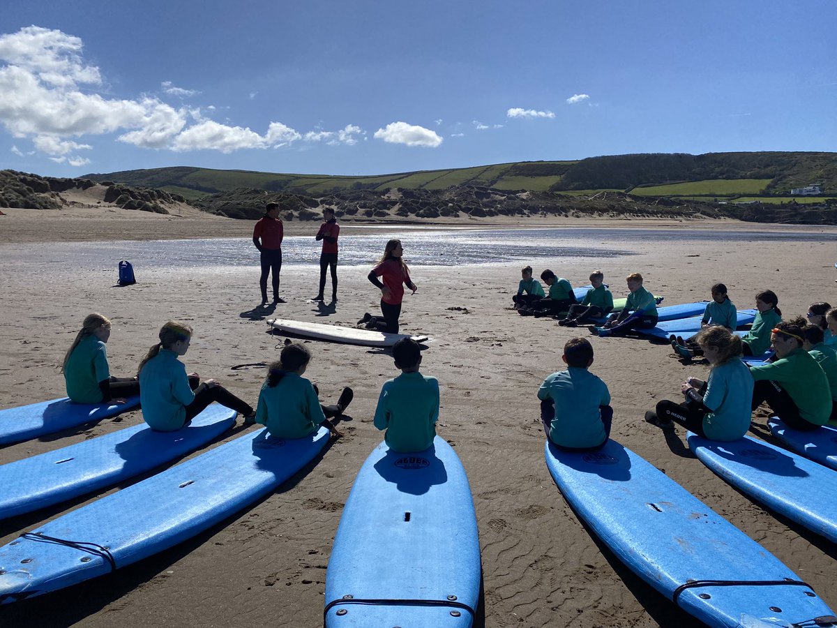 CFPSchool's tweet photo. What a beautiful start to the day - year 5 surfing in the sunshine 🌊☀️ @LEOacademies #CFDevon24 #WeAreLEO🦁 https://t.co/ZbxtDQKbxp