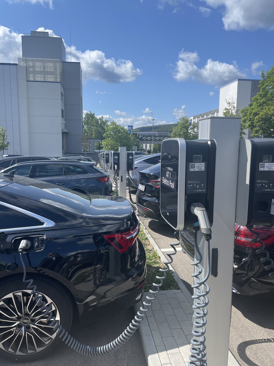 Company entrance and employee parking lot in Germany. Lots of PHEVs.