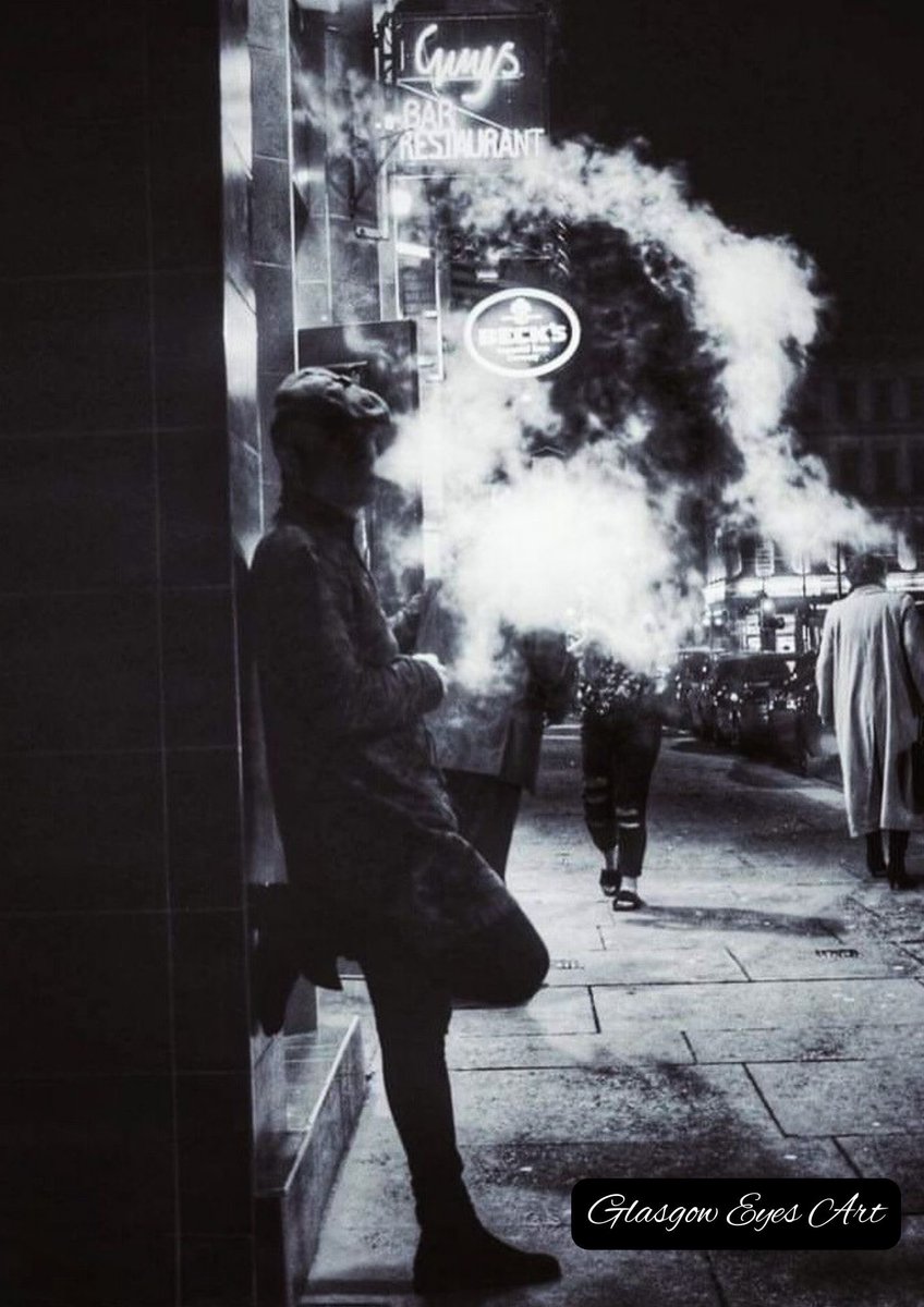 Moody shot of a mysterious guy vaping outside a bar around 2015

Street unknown anyone know 

Glasgow Eyes

#photooftheday #glasgow #Photography #streetphotography #documentaryphotography