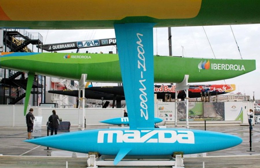 CupInfo's tweet photo. #TBT (memory lane trip seems appropriate as new #AC75 race boats are shown to the world). America's Cup Challenger Desafío Español ESP-88 &amp; ESP-97 bulbs on #AC32 unveil day, 2024 equivalent: race foils. Photo © https://t.co/mbvxZpdx71 | #AC37 #Barcelona #AmericasCup @americascup https://t.co/B9crSwJ2xV